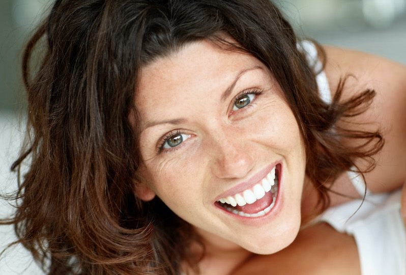 brunet woman smiling 